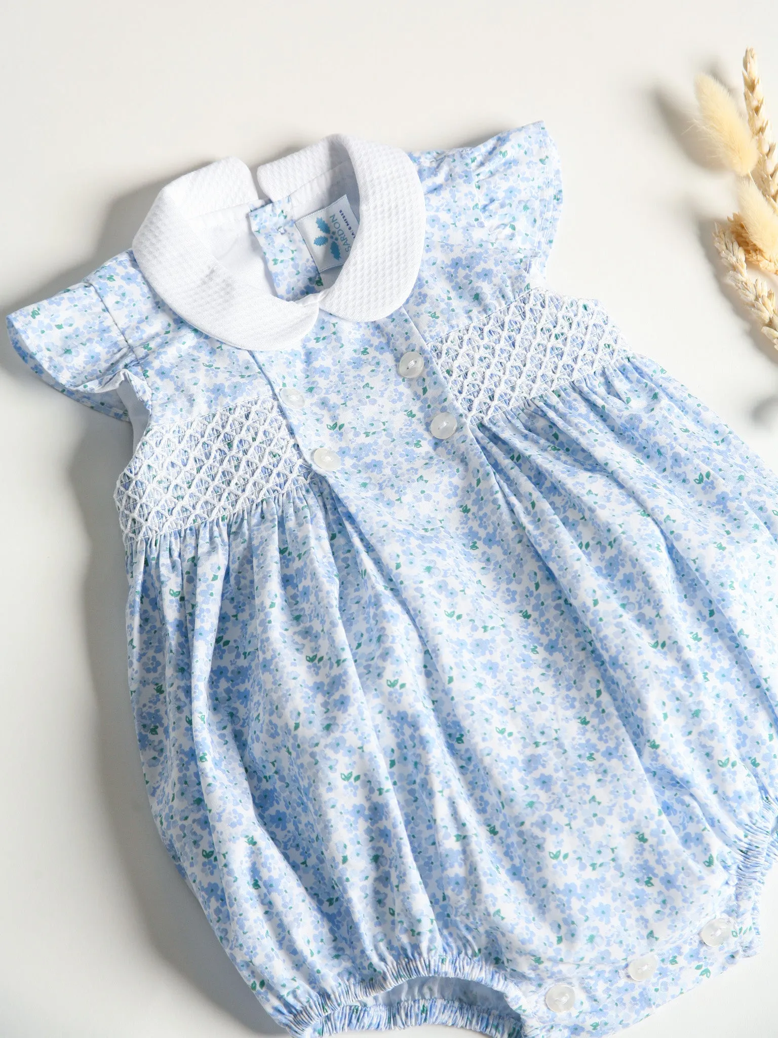 Sardon Blue Ditsy Floral Print Smocked Romper